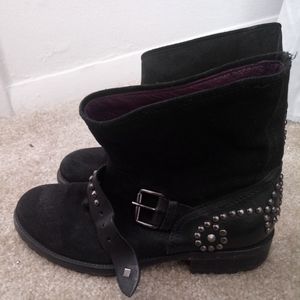 Boots, with studs.